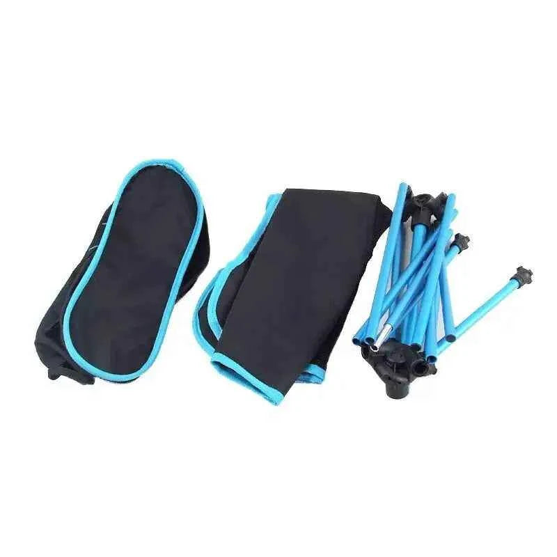 Folded Trail Teck Moon Chair components with fabric seat, aluminum frame poles, and compact carry bag for lightweight camping and outdoor use