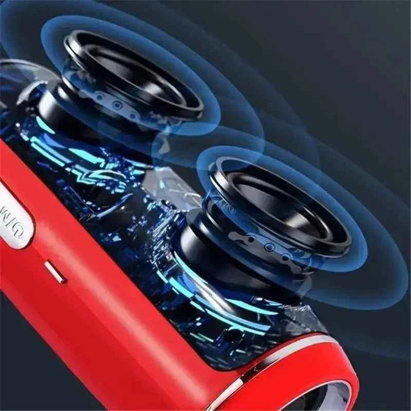 High-power waterproof Bluetooth speaker showing dual internal drivers with 360-degree surround sound and enhanced bass output