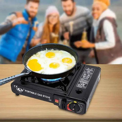 Portable camping gas stove cooking eggs outdoors, compact single-burner butane stove for camping, tailgating, and outdoor cooking by Trail Teck